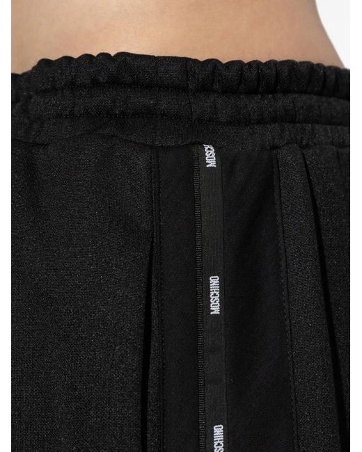 Moschino Black Logo Stripe Trousers for men