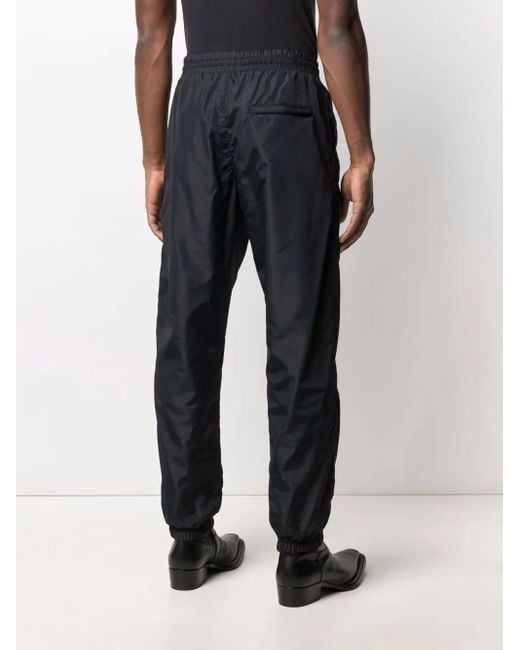 Moschino Blue Logo-Print Track Pants for men