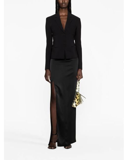 Blazer de vestir con botones Genny de color Black