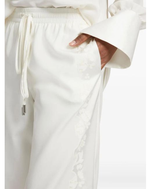 Pantalones con bordado y raya lateral Ermanno Scervino de color White