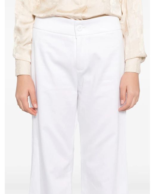 BLAKLACE White Flared Trousers