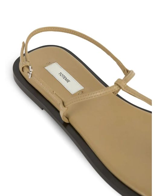 Totême White T-Strap Leather Sandals