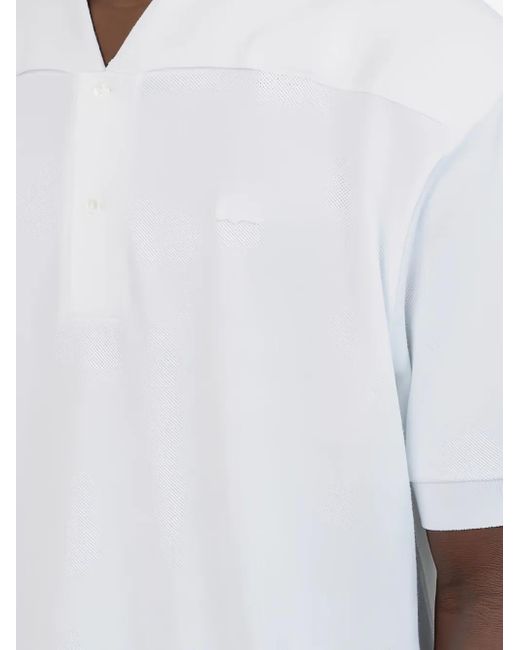 Polo con cuello en V Lacoste de hombre de color White