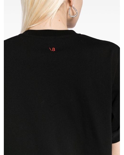 T-shirt en coton à slogan imprimé Victoria Beckham en coloris Black
