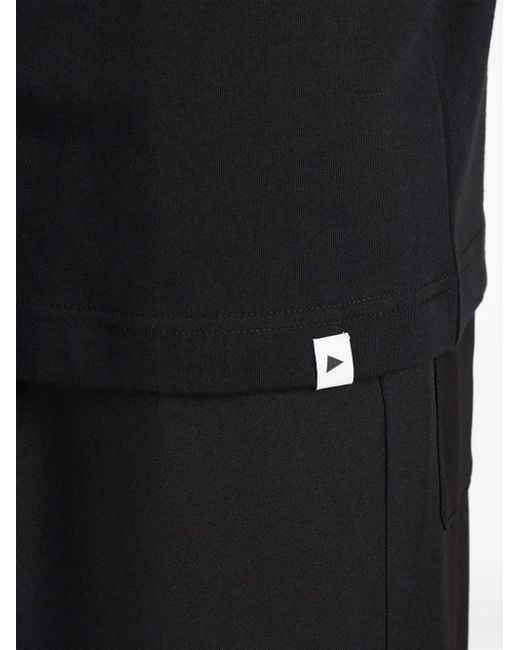 And Wander T-Shirt Met Logoprint in het Black