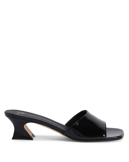 Mules Solhene di Giuseppe Zanotti in Black