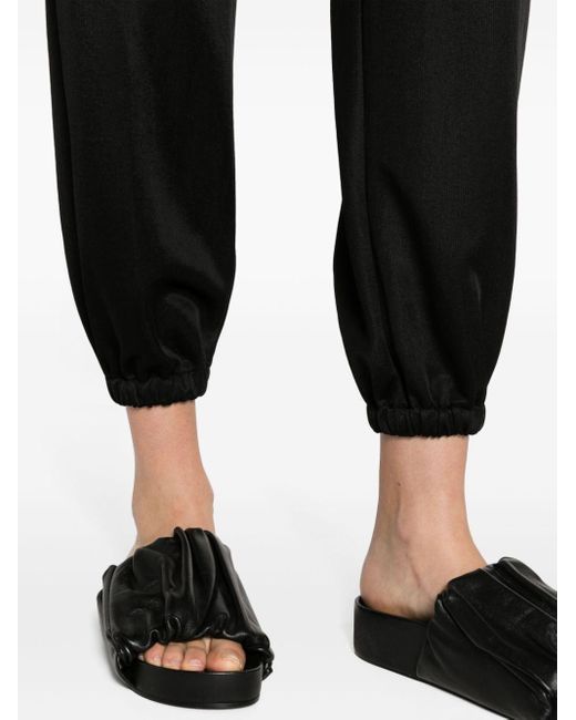 Pantalon fuselé à taille haute Jil Sander en coloris Black