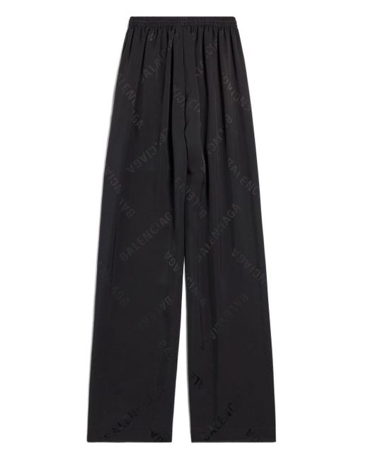 Pantalones anchos con logo en jacquard Balenciaga de color Black
