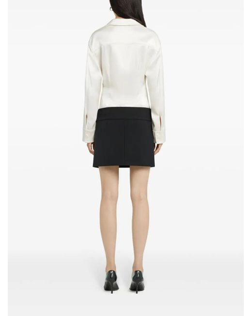 Minijupe À Taille Ceinturée Courreges en coloris Black