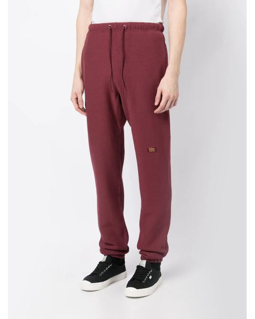 Advisory Board Crystals Red Logo-Patch Track Pants for men