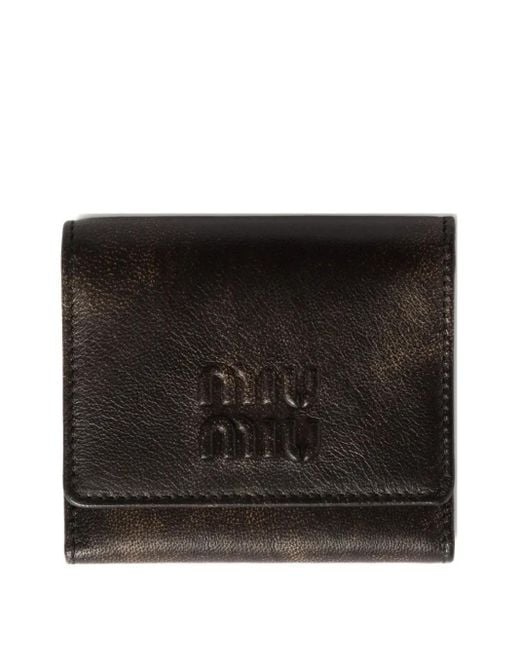 Cartera con logo en relieve Miu Miu de color Black