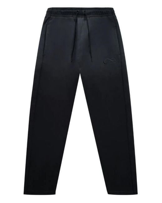 Pantalones de chándal con cordones Nike de hombre de color Blue