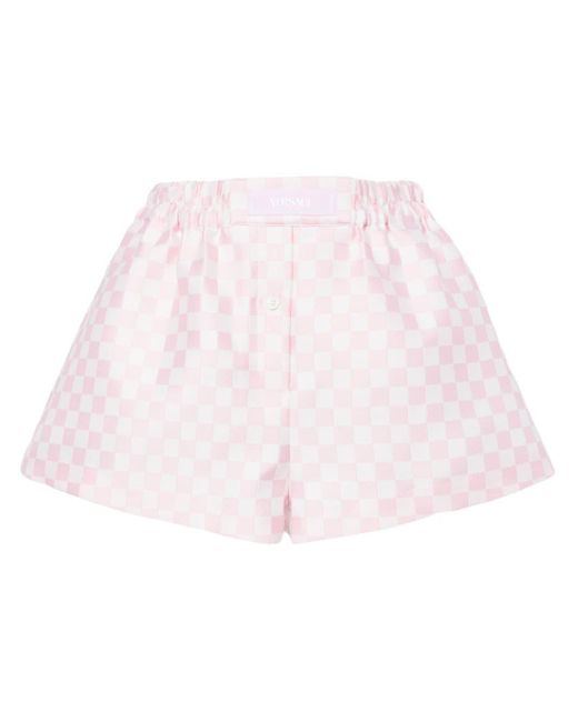 Checked logo-appliqué shorts Versace en coloris Pink