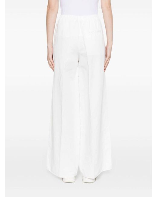 Pantalon en serge à coupe ample Forte Forte en coloris White