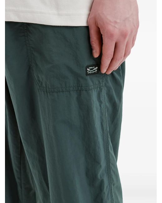 Chocoolate Green Logo-Patch Trousers for men