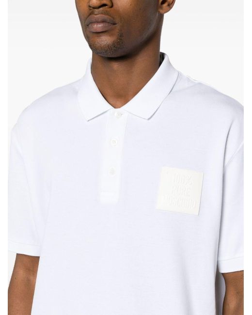 Polo en coton à patch logo Moschino pour homme en coloris White