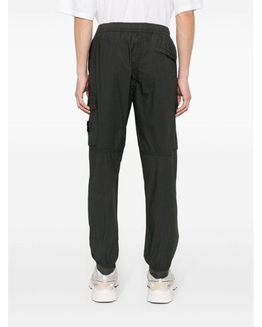 Stone Island Black Compass-badge Tapered Leg Trousers for men