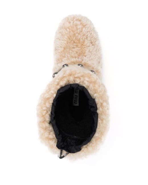 Botas de pelo con apliques Miu Miu de Caucho de color Neutro | Lyst