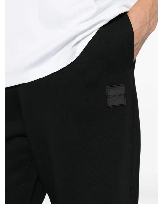 Calvin Klein White Logo-Patch Track Pants for men