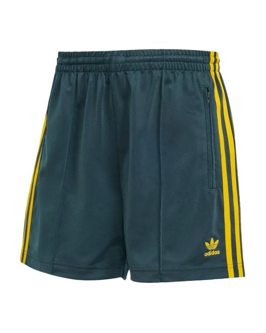 Pantalones cortos con tres rayas Adidas de color Blue