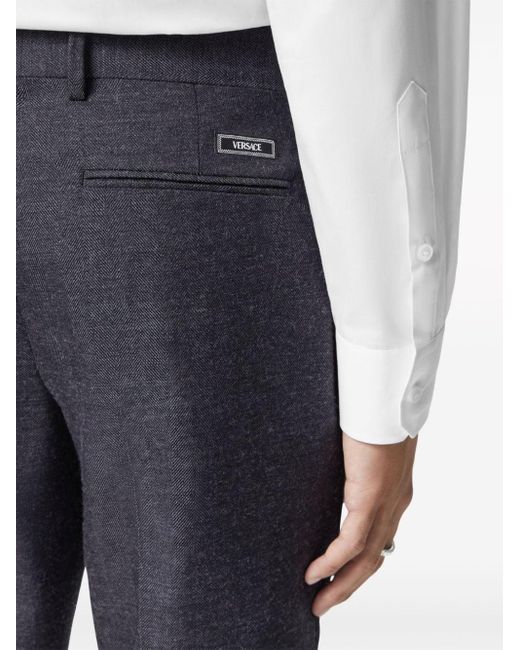 Versace Geplooide Katoenen Pantalon in het Blue voor heren