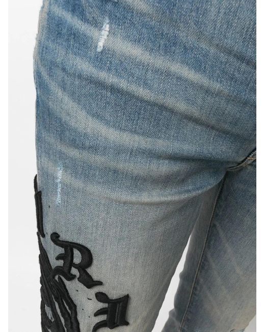 Amiri Blue Logo-Embroidered Skinny Jeans for men