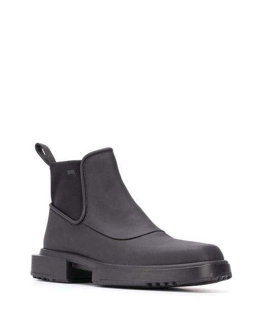 camper black boots