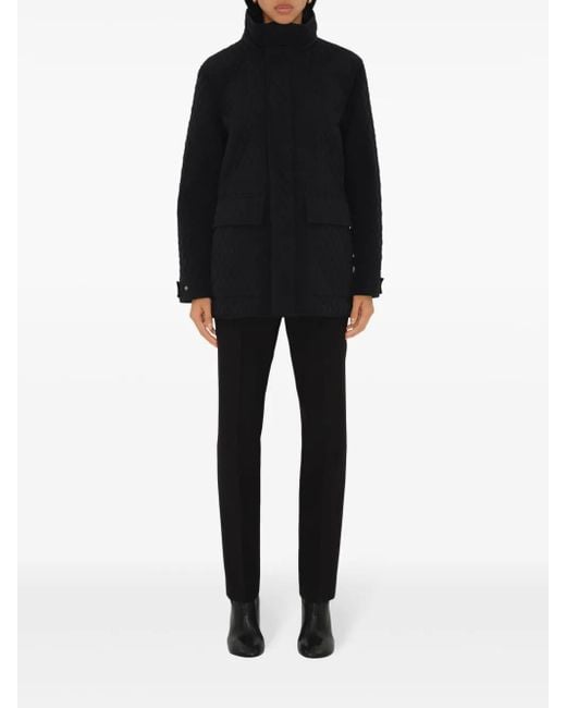 Plumífero con capucha Burberry de color Black