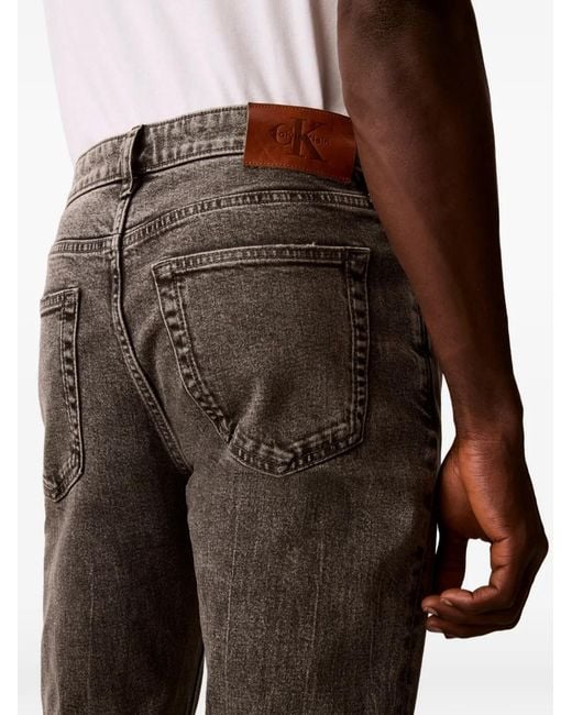 Calvin Klein Gray Logo-Patch Acid-Wash Jeans for men