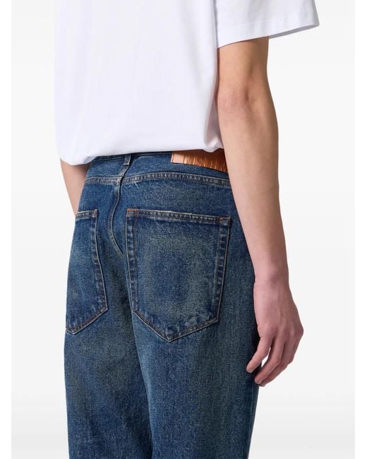 MSGM Blue Logo-Embroidered Faded Jeans for men