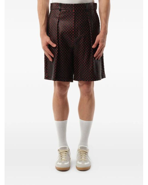 Givenchy Black Cross-Embroidered Leather Shorts for men