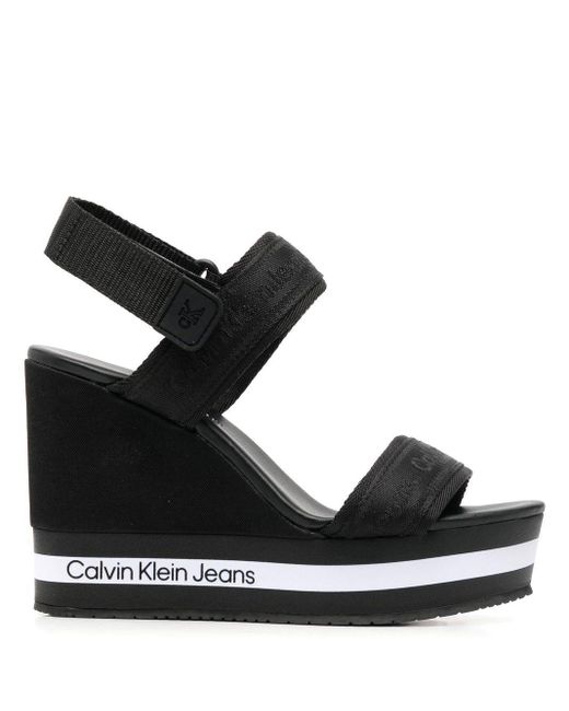 Calvin Klein Logo-motif Wedge-heel Sandals in Black | Lyst Canada