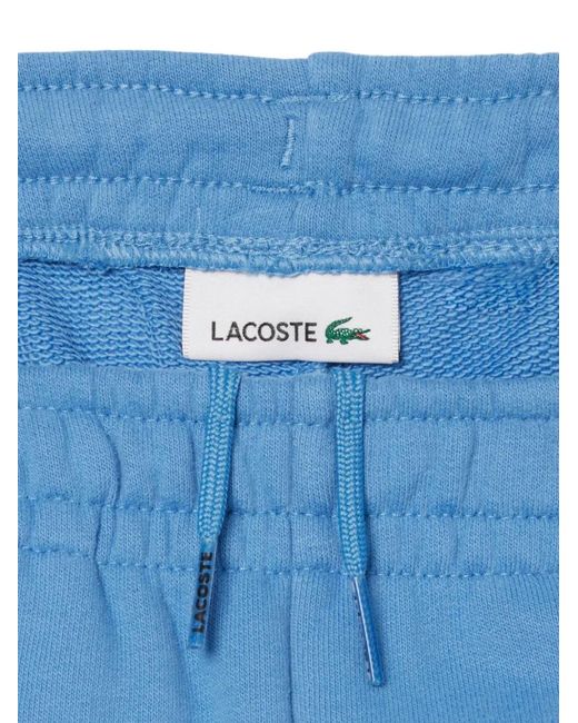 Lacoste レディース ブルー ストライプ ロゴ トラックパンツの通販はau