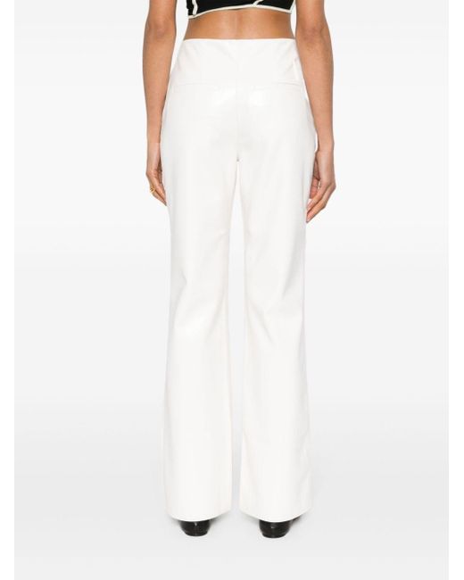 Pantalon Manola à coupe droite Nanushka en coloris White