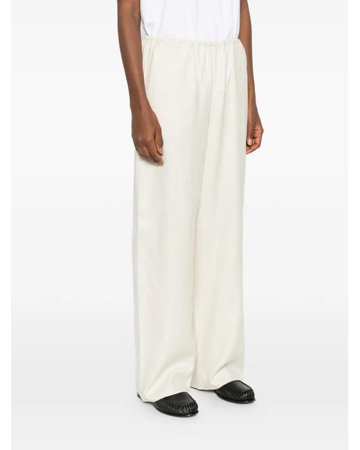 Totême White Monogram-Pattern Trousers