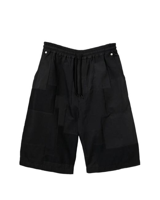 Comme des Garçons Black Patchwork Shorts for men