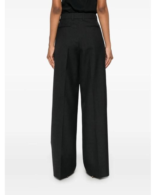 Pantalones de pinzas Gucci de color Black