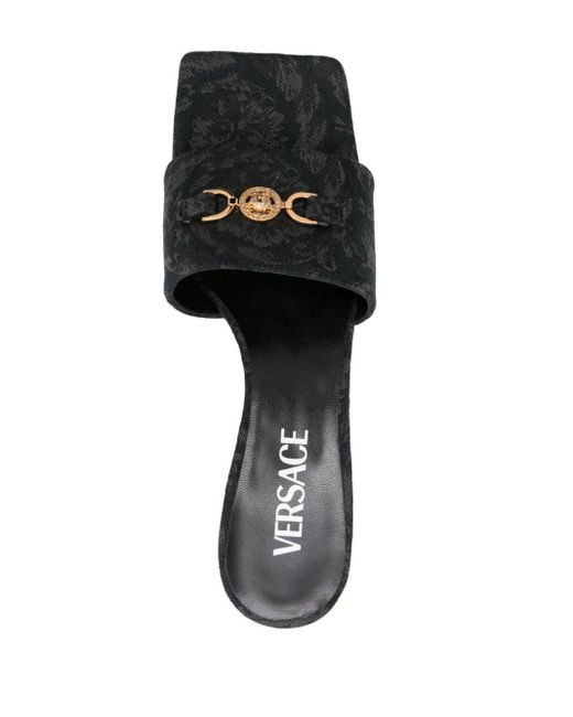 Mules à motif Barocco 60 mm Versace en coloris Black
