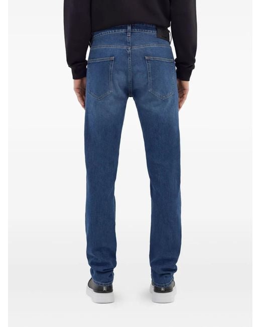 Roberto Cavalli Blue Logo-Appliqué Skinny-Cut Jeans for men