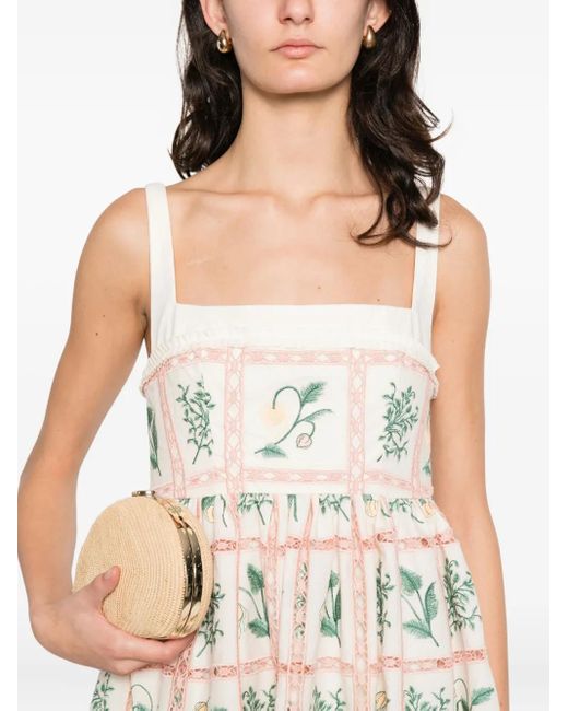 Vestido corto con motivo floral Agua Bendita de color White