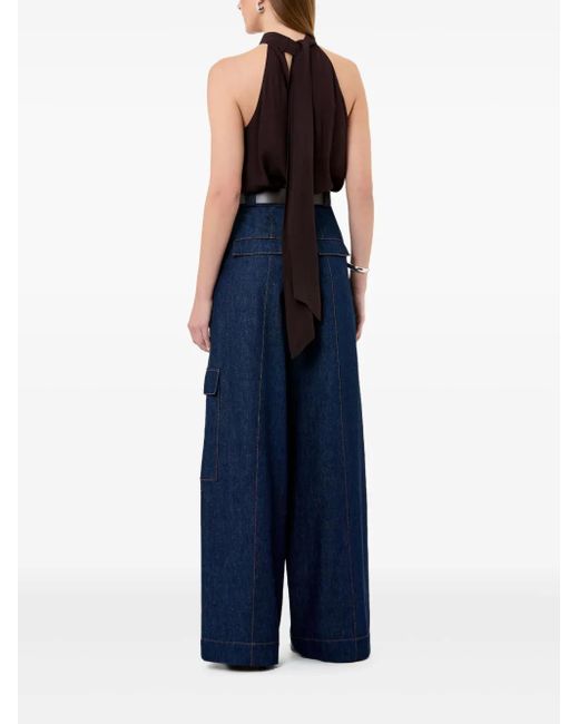 Top Sumira con botones y lazo en el cuello Nicholas de color Black