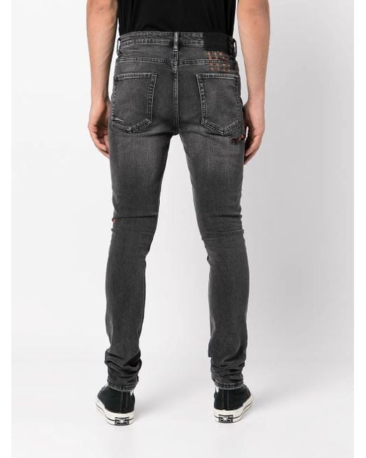 Vaqueros skinny con detalles rasgados Ksubi de hombre de color Gray