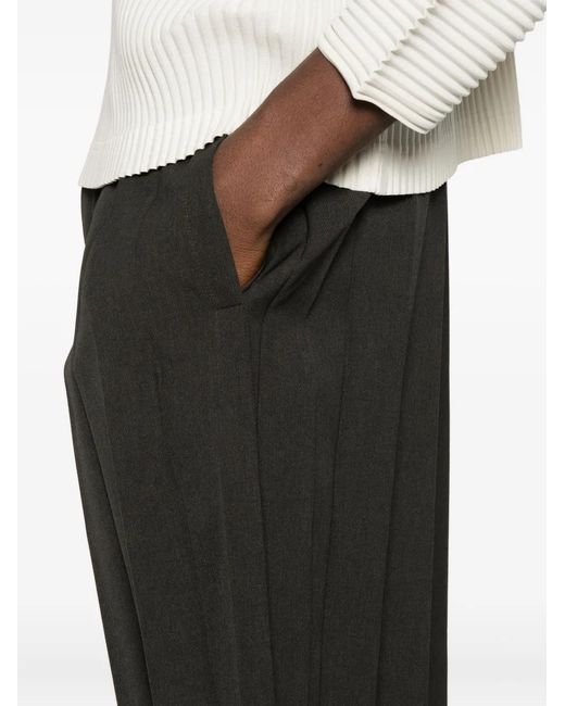 Homme Plissé Issey Miyake Black Pleated Shorts for men
