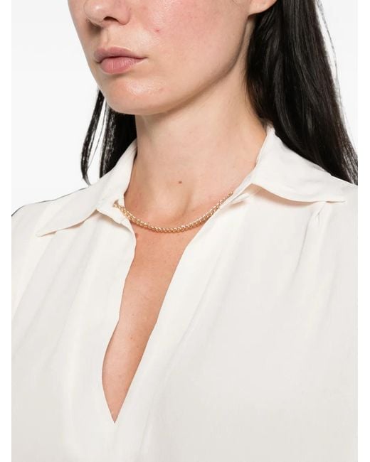 Imperial White Sleeveless V-Neck Top