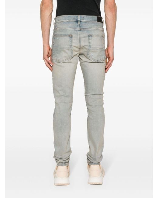 Amiri Skinny-Jeans mit Logo-Applikation in Gray für Herren