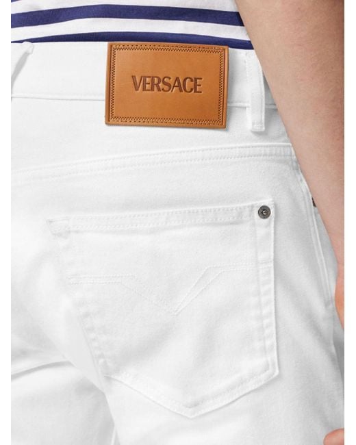 メンズ Versace メドゥーサ ストレートジーンズ White