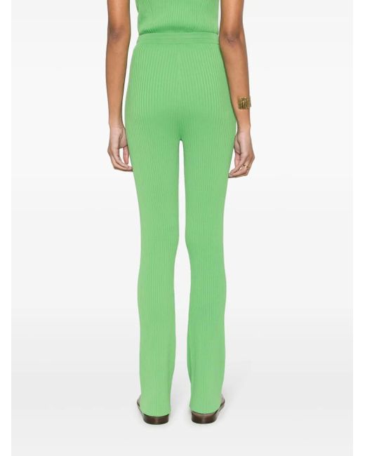 Pantalones de canalé Cornelie acampanados Nanushka de color Green