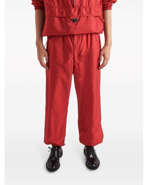 Pantalon de jogging en nylon recyclé Prada pour homme en coloris Red