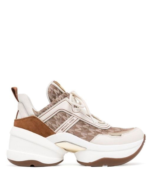 Michael Kors Olympia Sneakers Met Monogram het Bruin | Lyst NL