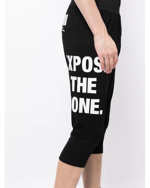 Nils Black Slogan-Print Drop-Crotch Shorts for men